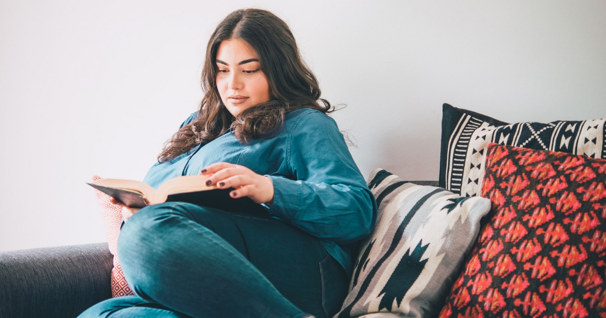 plus size woman reading body positive books