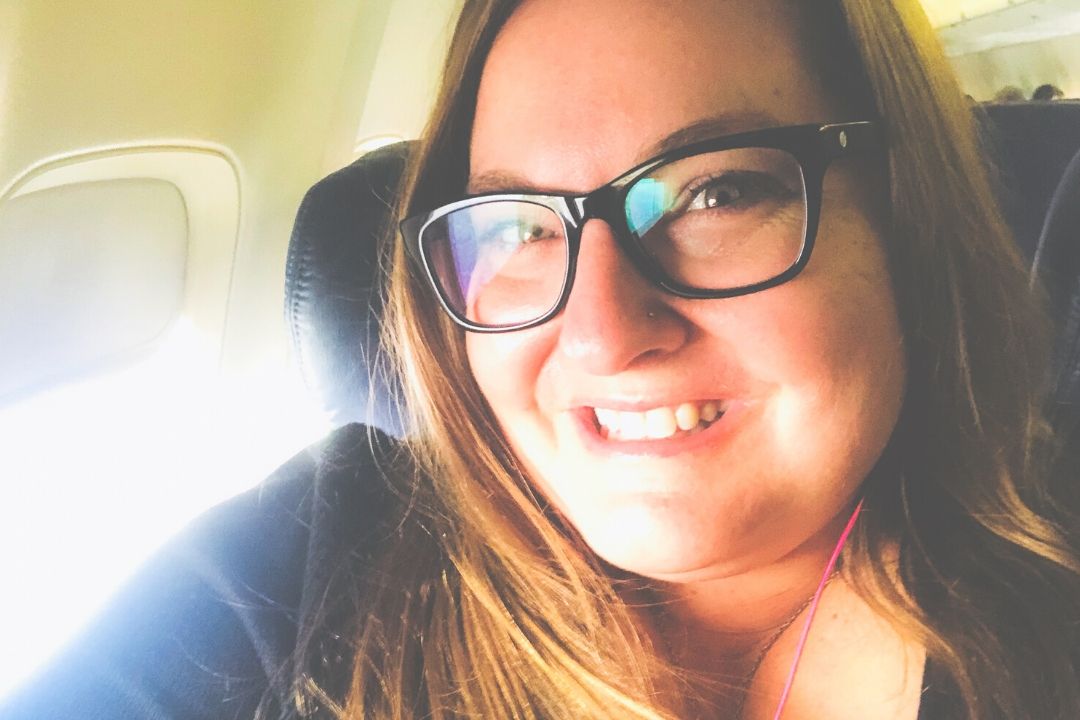 plus size woman flying while fat on an airplane