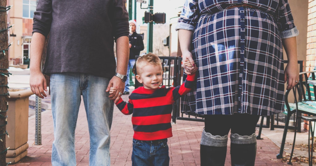 Plus size couple with their son