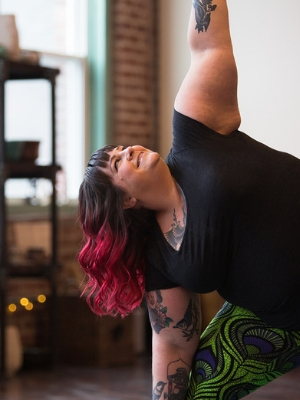 plus size woman doing yoga 