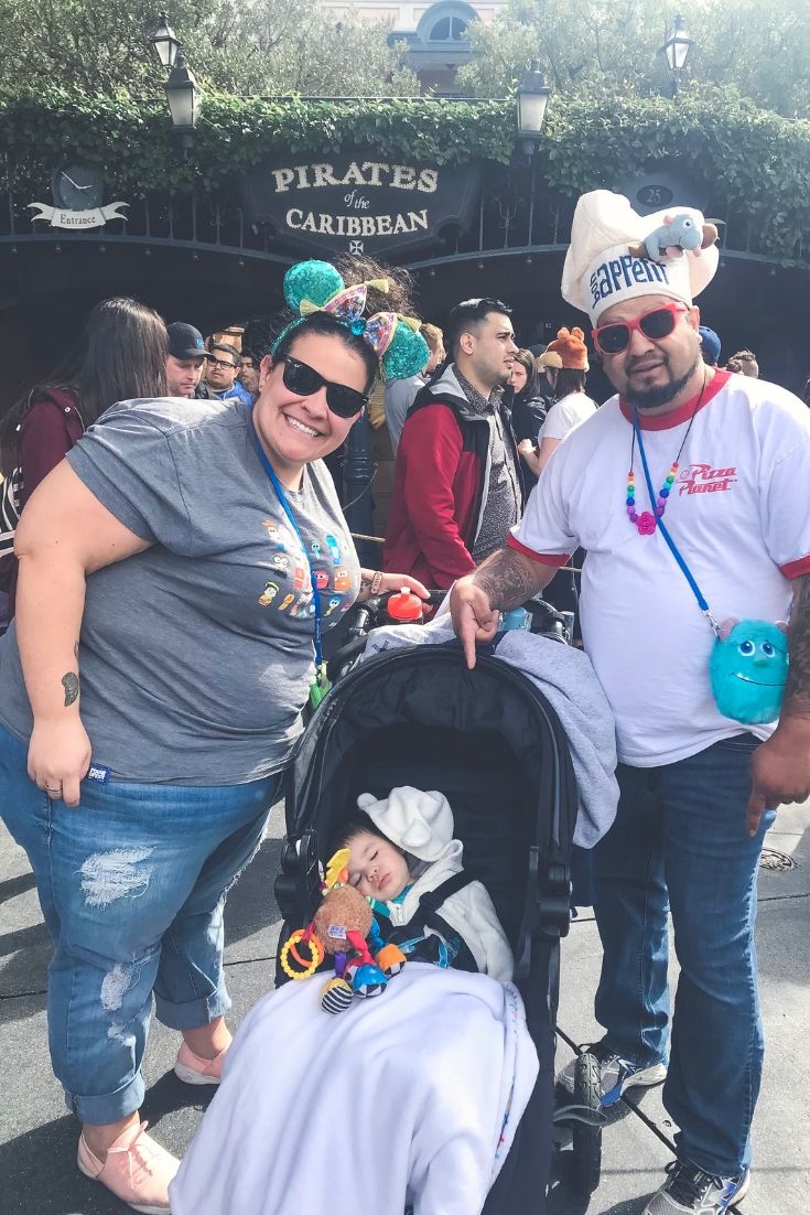 Sam Reyes and her family in front of the Pirates of the Caribbean attraction