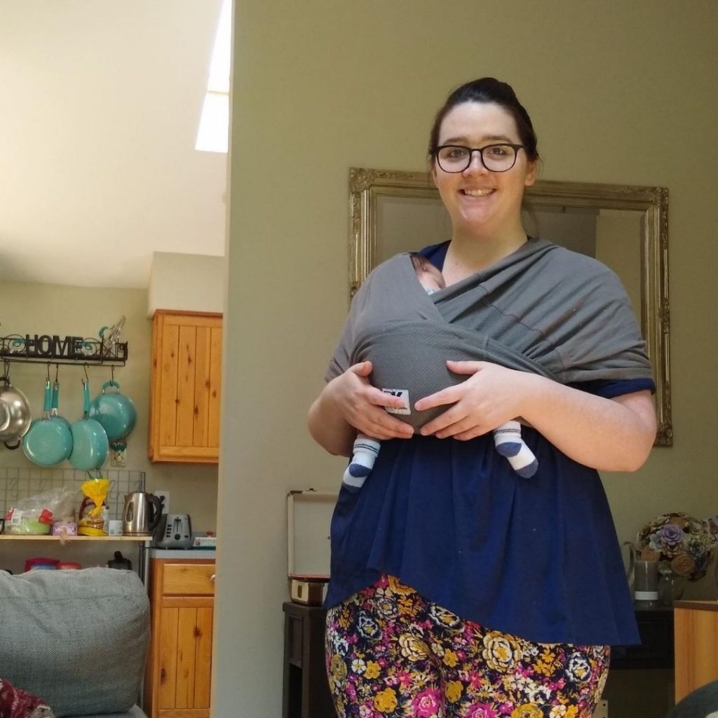 plus size woman babywearing 