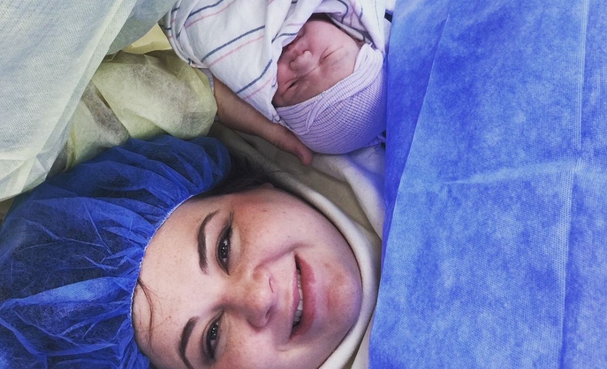 plus size woman and baby following a plus size cesarean birth