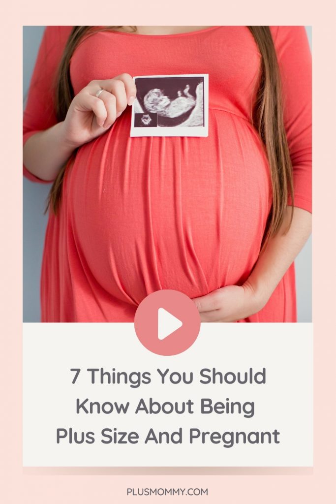 plus size and pregnant woman holding an ultrasound 