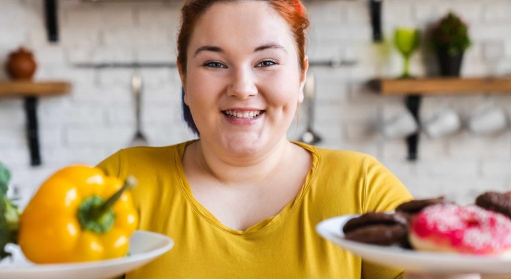 plus size woman eating food