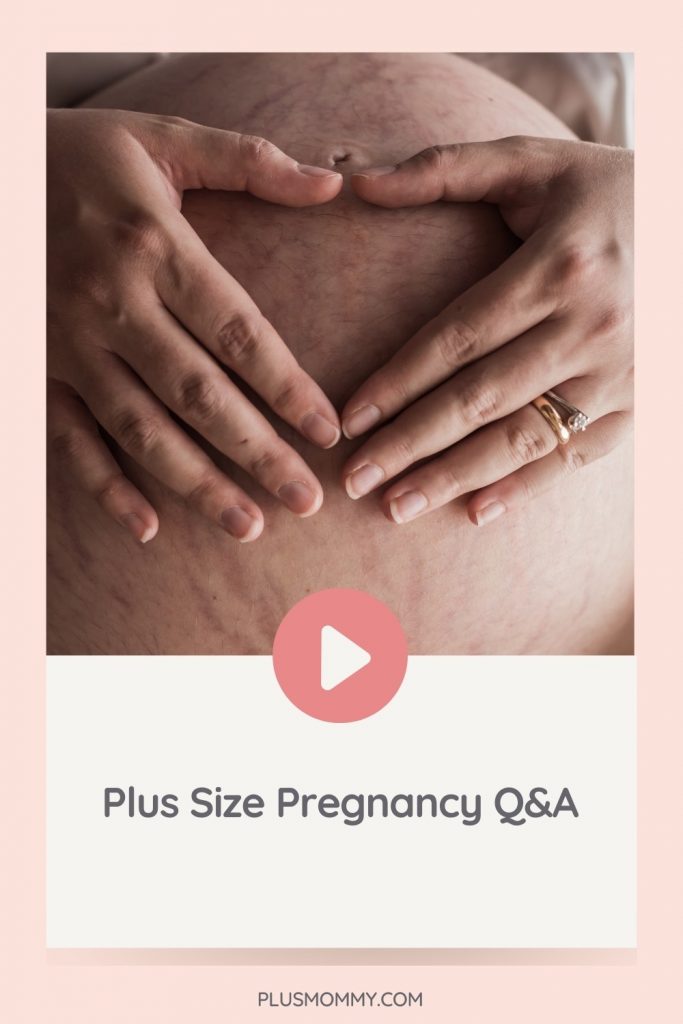 closeup of plus size pregnancy belly with stretch marks.  