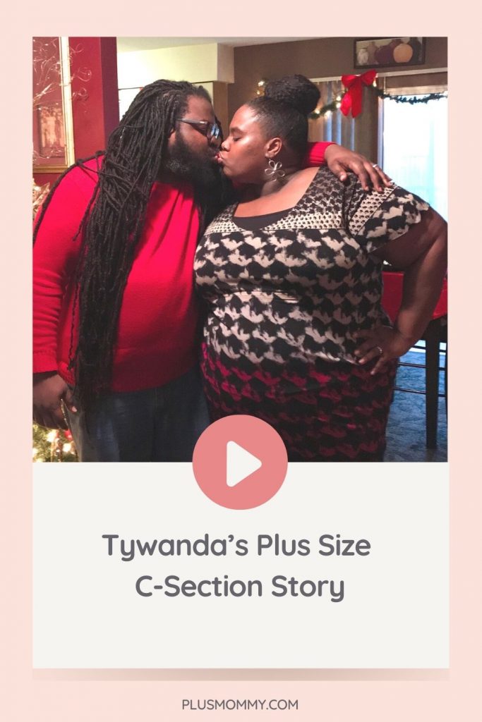 plus size pregnant woman kissing husband 