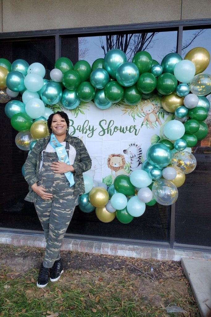 plus size pregnant woman at baby shower 