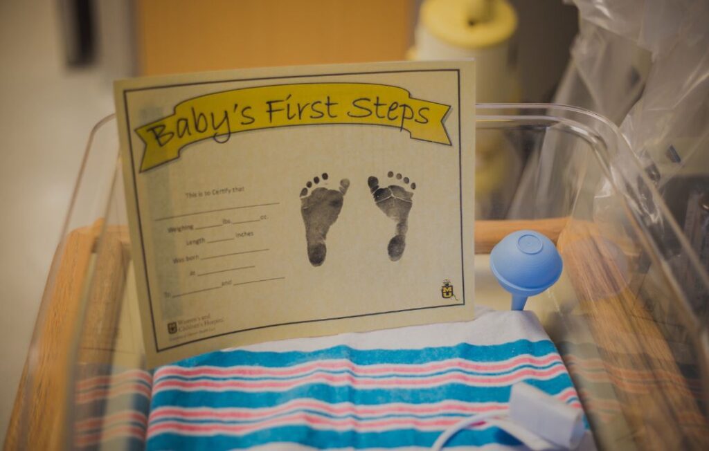 newborn baby bed and foot prints 