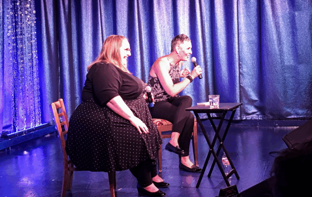 Jen McLellan and Debbie Scheer on stage for comedy show